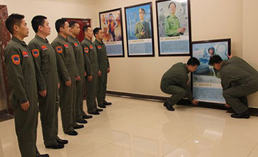 Pilot who died practicing landing fighter jet on carrier honored among exemplary PLA soldiers