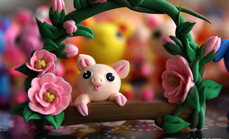 Folk artist turns clay into piggy figurines to welcome Year of the Pig