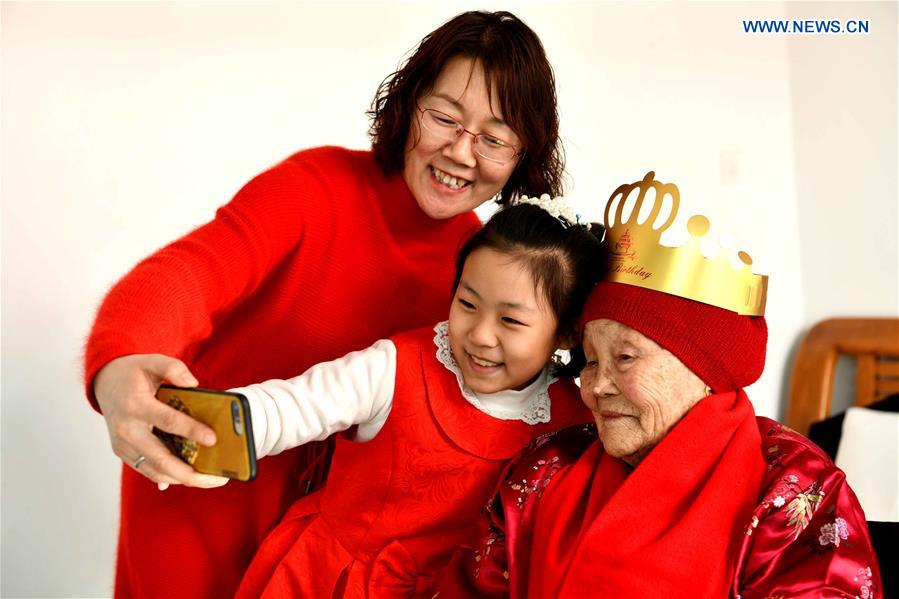 Centenarian celebrates her 105th birthday with family on 1st day of Chinese Lunar New Year