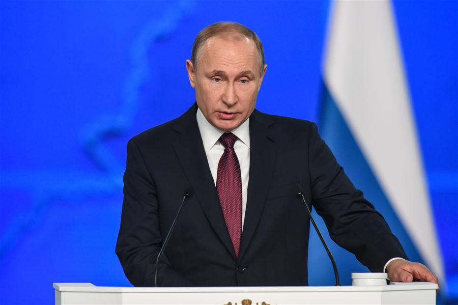 Putin pledges to increase social spending, strengthen defense in annual address