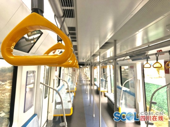 Students play online games inside a subway train in Beijing