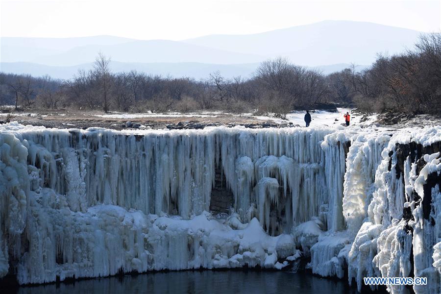 Scenery of frozen Diaoshuilou Waterfall in Heilongjiang, China