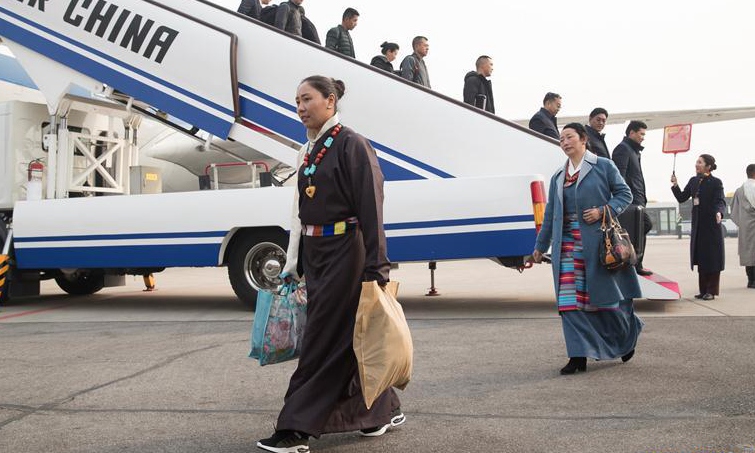 Deputies to 13th NPC from China's Tibet arrive in Beijing