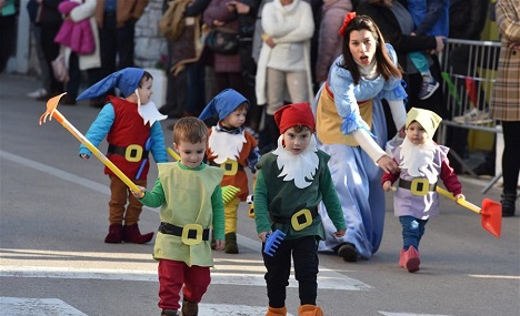 Children in costumes take part in Murter Carnival parade