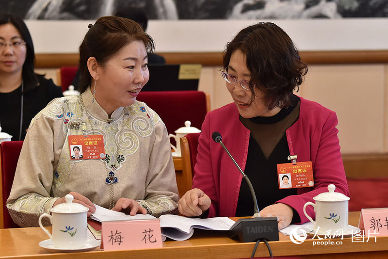 Int'l Women's Day marked at China’s Two Sessions