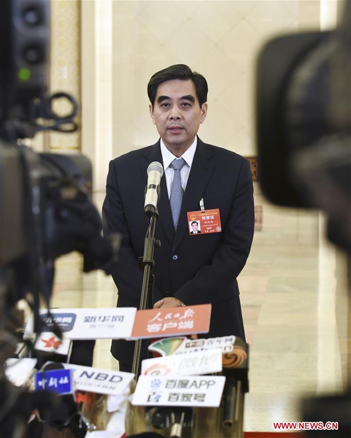 Ministers receive interview after 3rd plenary meeting of 2nd session of 13th NPC