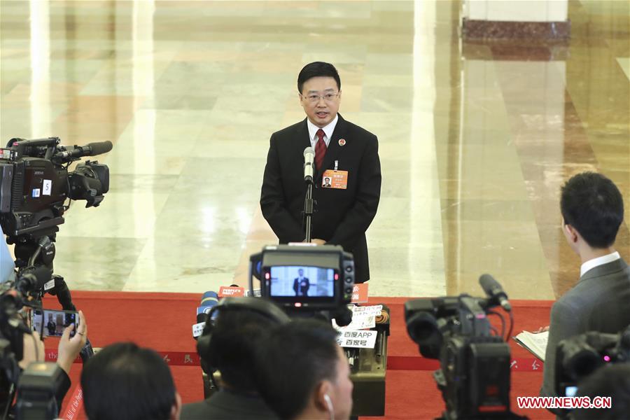 Ministers receive interview after 3rd plenary meeting of 2nd session of 13th NPC