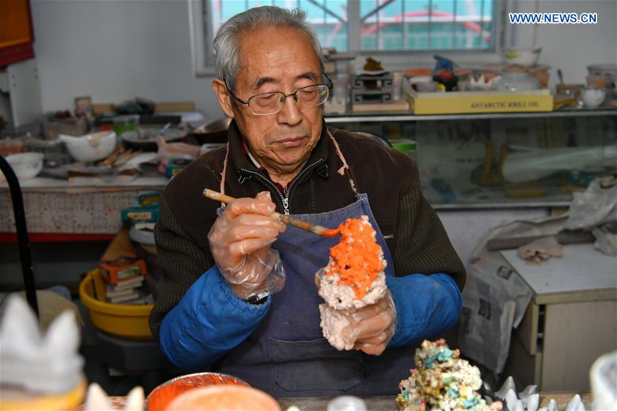 Inheritor of coloured glaze firing skill transforms waste into artwork in China's Shanxi