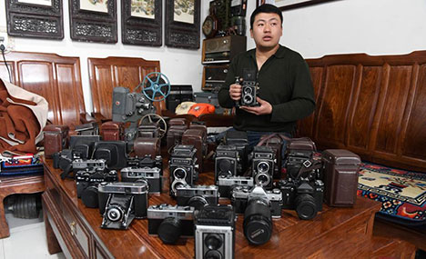 Man collects 1,200 old-fashioned cameras