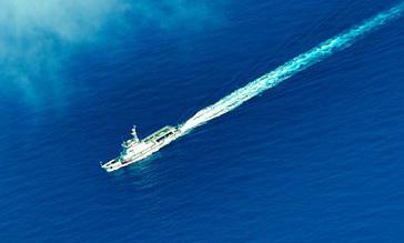 China warns US ships to leave sea