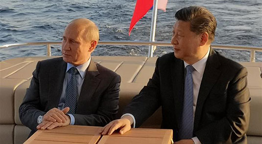 Xi, Putin meet in St. Petersburg