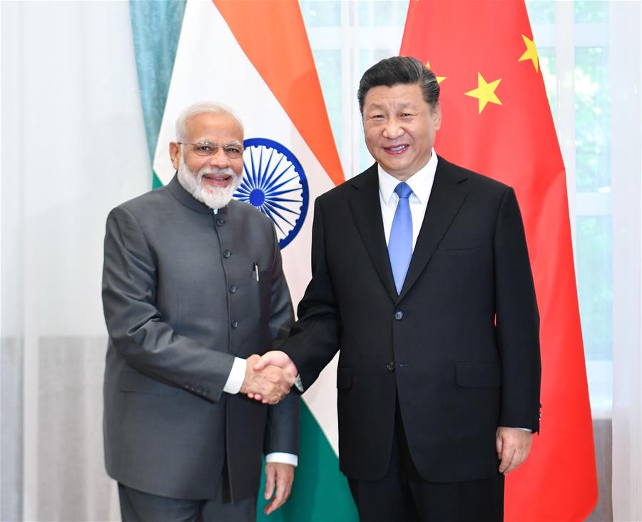 Chinese President Xi Jinping meets with Indian Prime Minister Narendra Modi in Bishkek, Kyrgyzstan, June 13, 2019. (Xinhua/Yin Bogu)