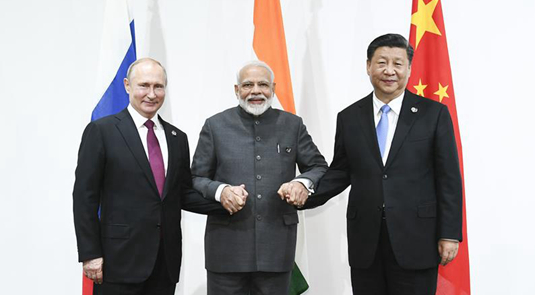 Xi, Putin, Modi pledge to bolster trilateral cooperation for world prosperity