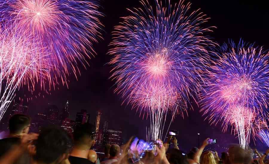 People watch fireworks during U.S. Independence Day celebration