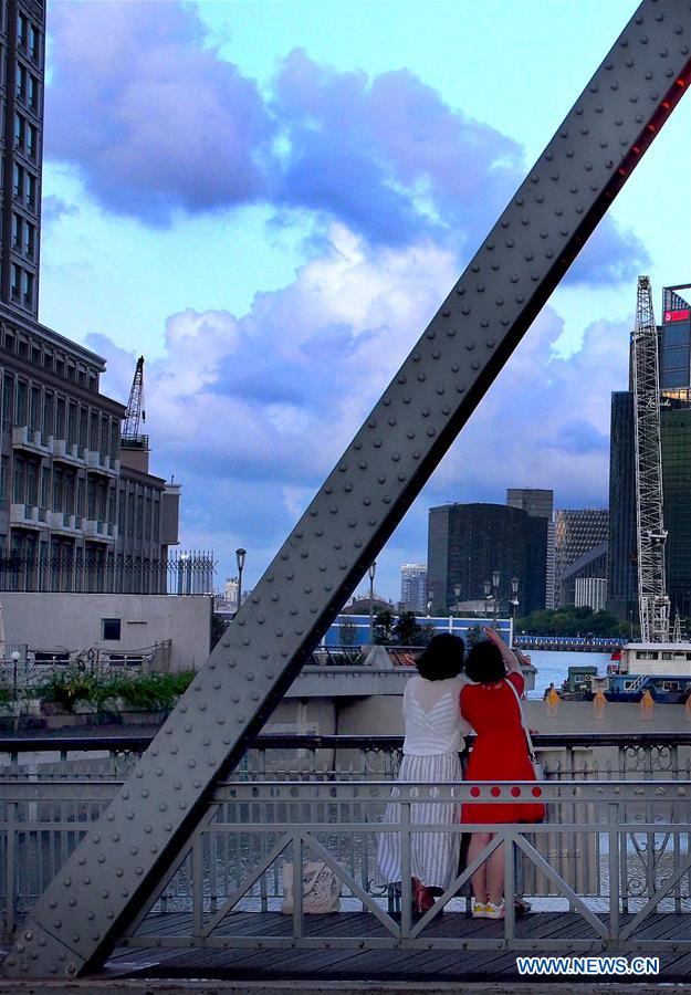 People visit Bund in east China's Shanghai