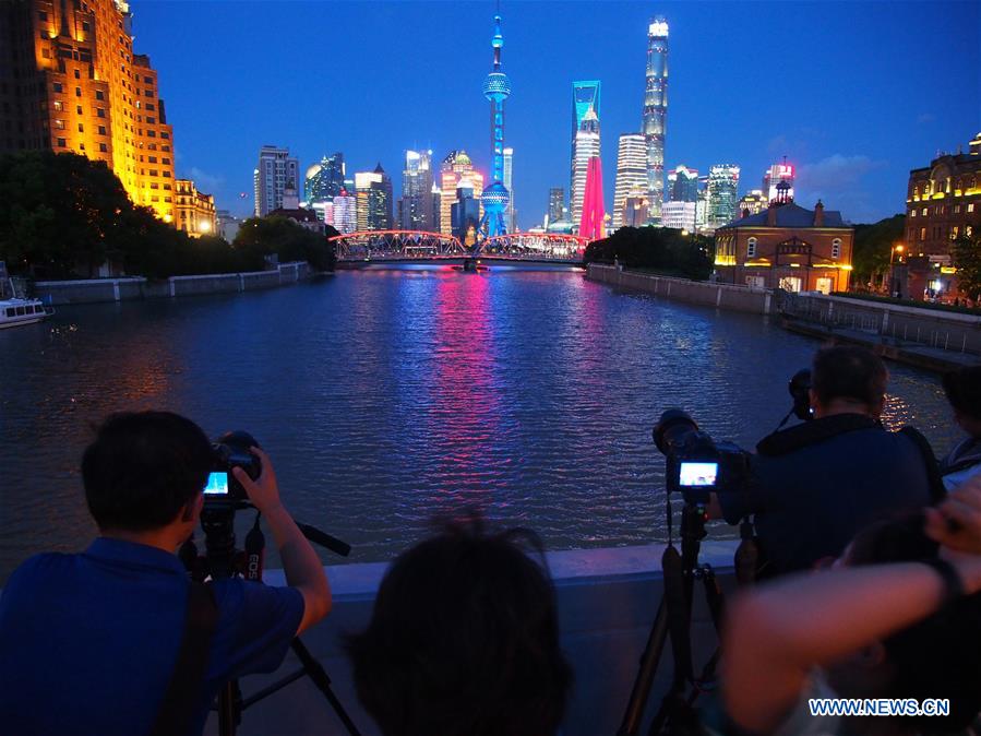 People visit Bund in east China's Shanghai