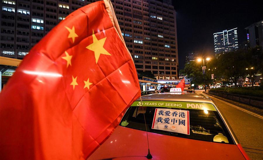 Taxis rally in Hong Kong calls for peace, restoring order