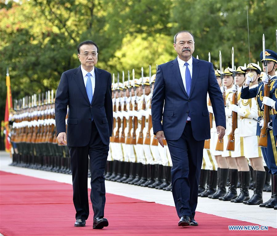 Chinese premier holds talks with Uzbek PM to boost ties