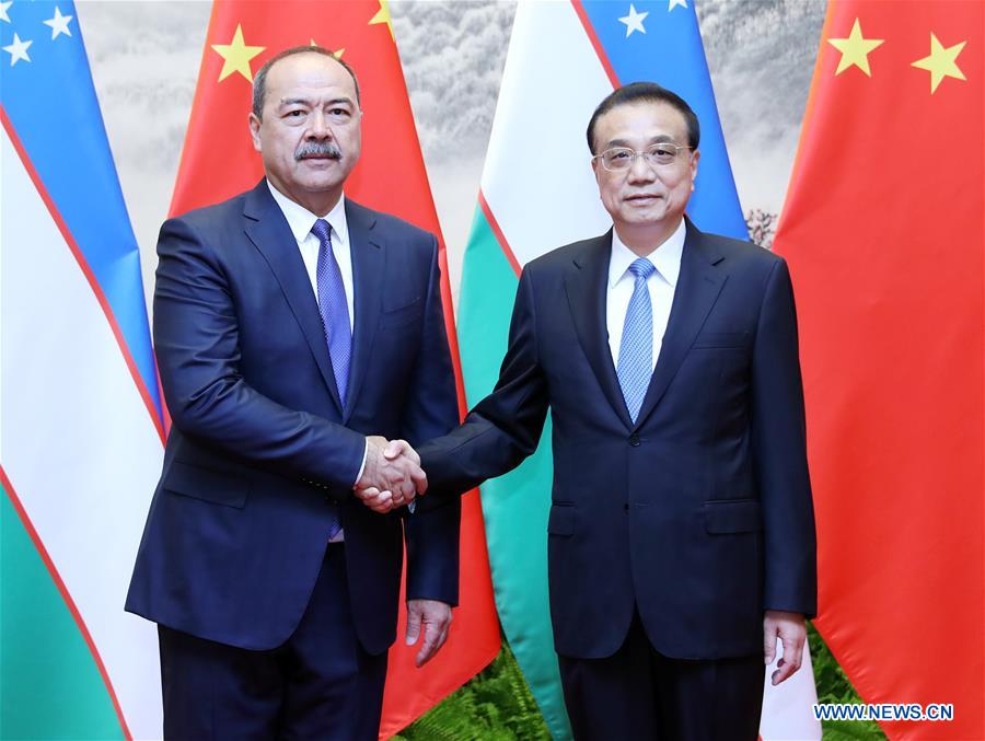 Chinese premier holds talks with Uzbek PM to boost ties