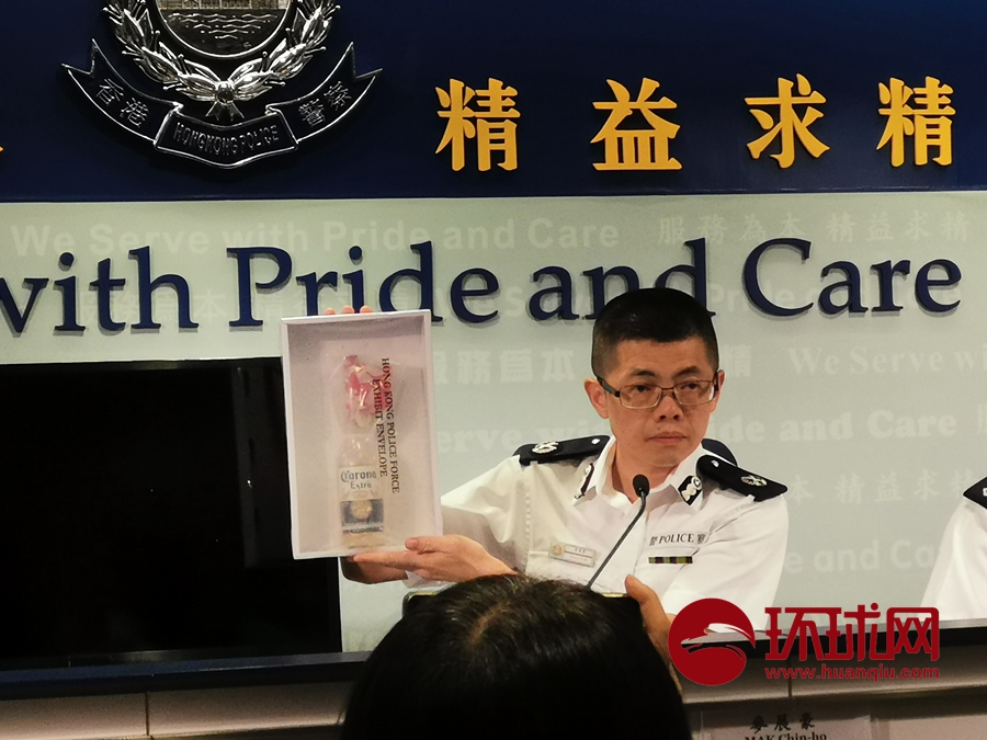 Hong Kong police show gasoline bombs, fake press cards seized from rioters