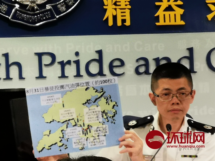 Hong Kong police show gasoline bombs, fake press cards seized from rioters