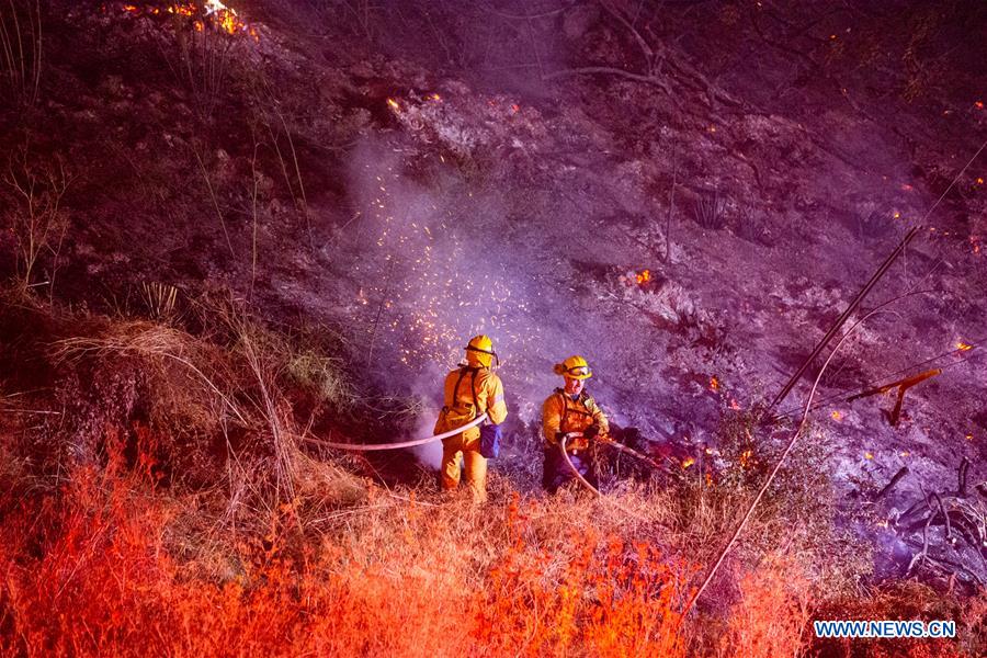 Thousands evacuated in Los Angeles over fast-moving wildfire near Getty Center