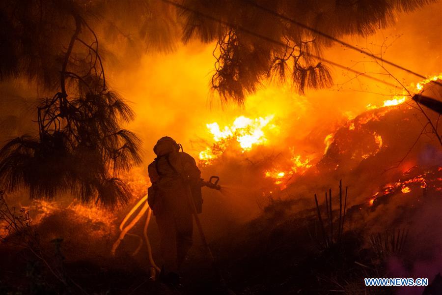 Thousands evacuated in Los Angeles over fast-moving wildfire near Getty Center