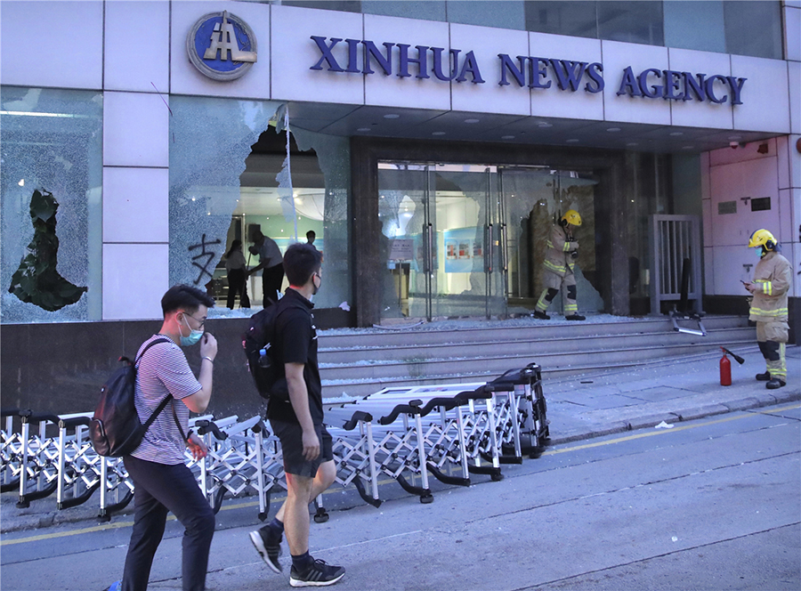 HK freedoms threatened by protesters' Xinhua rampage