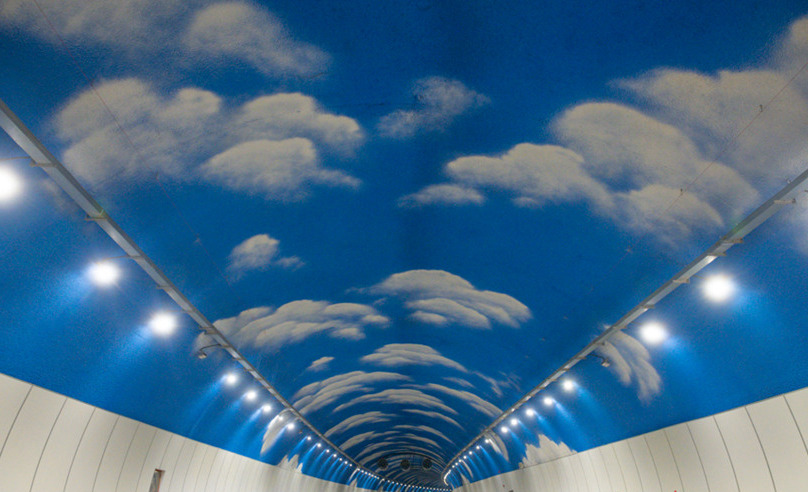 Longzhouwan tunnel painted with blue sky and white clouds opens