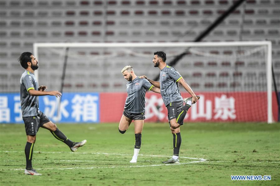 Players of China and Syria attend training sessions before group A match