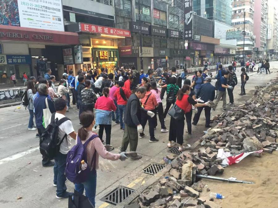 Volunteers clear the way for HK's recovery