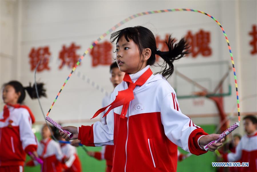 Pic story of rope jumping coach in Jilin, NE China's Jilin
