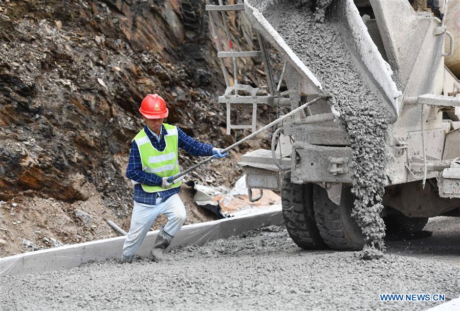 Locals to benefit from road building as part of poverty alleviation efforts in China's Guangxi