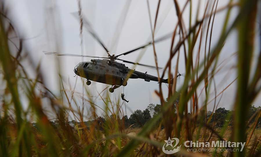 China-India troops practice insertion by helicopters