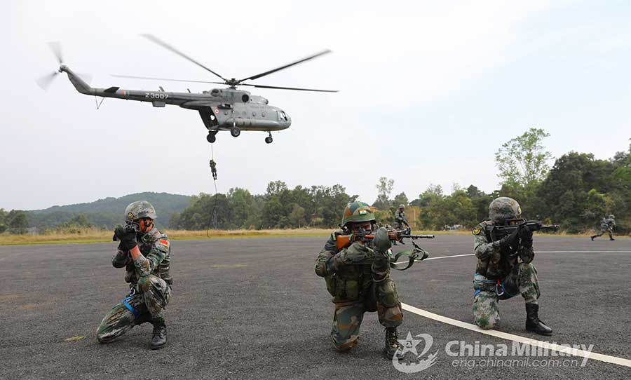 China-India troops practice insertion by helicopters