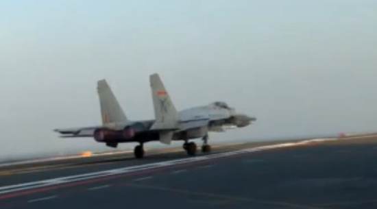 China's Shandong Aircraft Carrier with J-15 Fighter training aboard