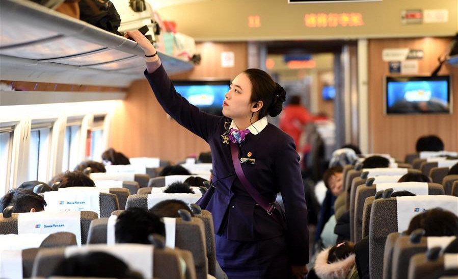 Young train crew employees make debut during Spring Festival travel rush