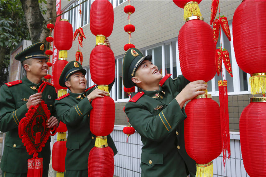 People's Armed Police soldiers decorate barracks to celebrate Chinese New Year