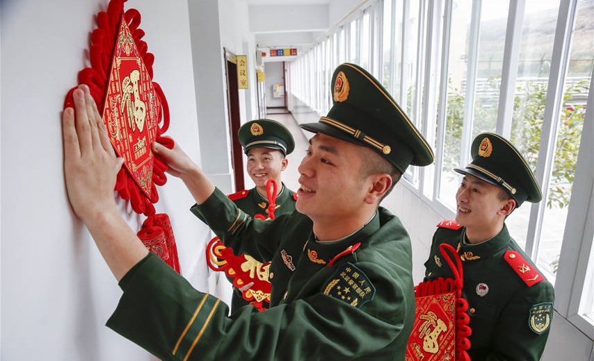 People's Armed Police soldiers decorate barracks to celebrate Chinese New Year
