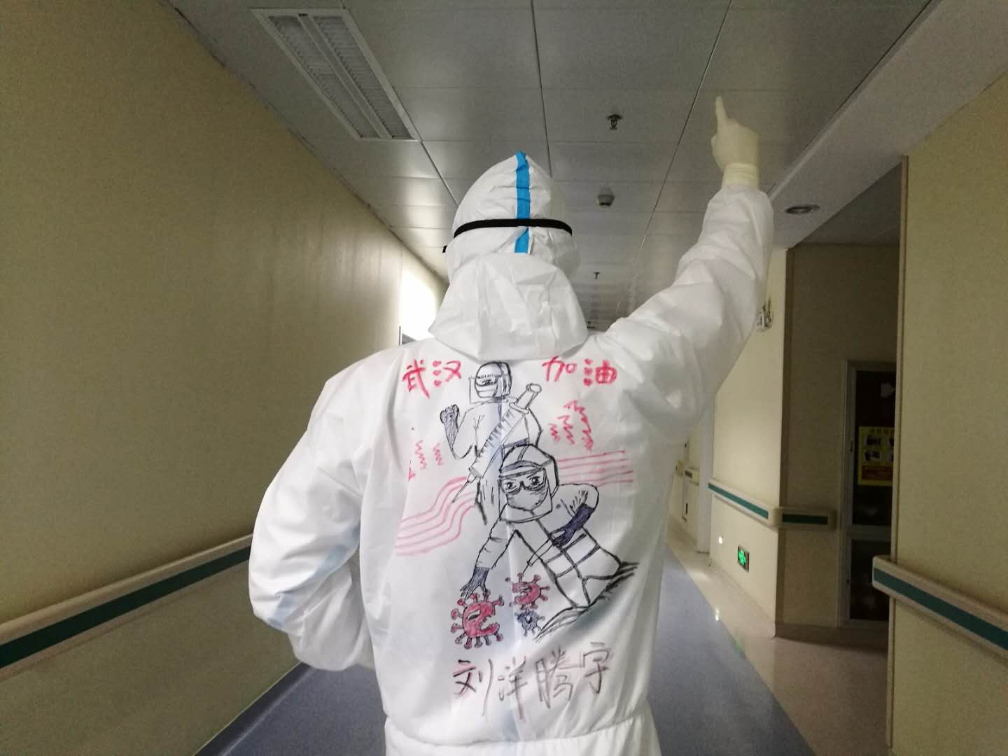 Post-90s frontline nurse draws on colleagues’ protective suits to boost morale