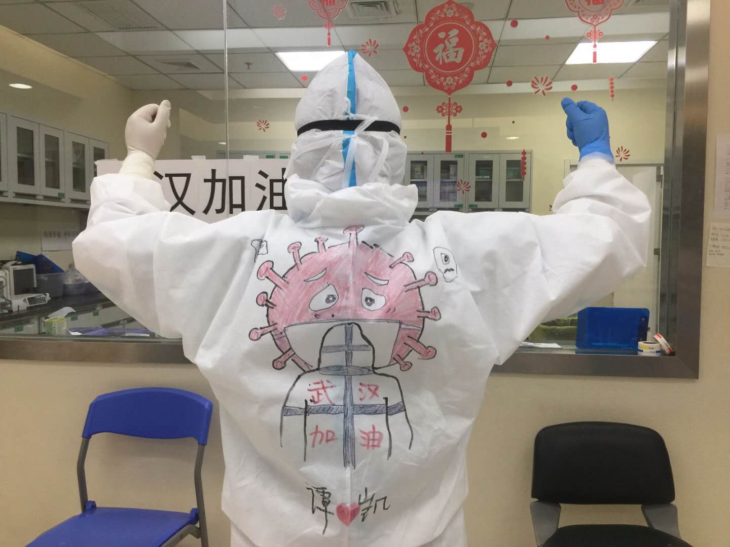 Post-90s frontline nurse draws on colleagues’ protective suits to boost morale