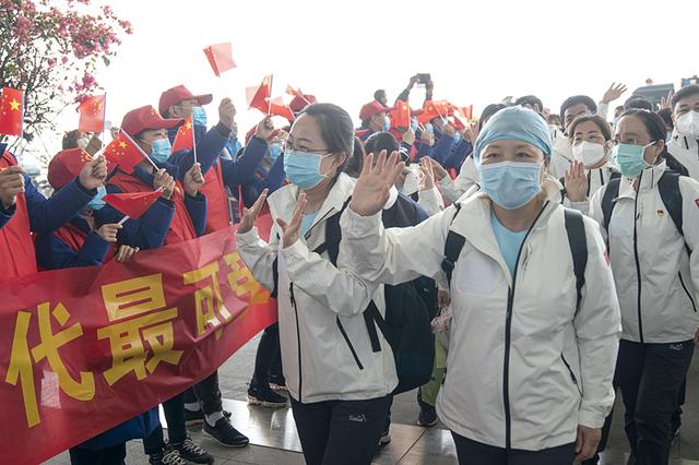 Medical team members leave Wuhan with ‘limited edition’ boarding passes