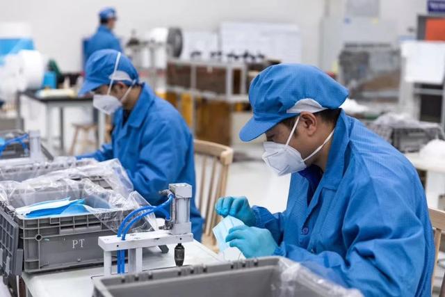 Chinese companies engage in cross-industry production to ensure medical supplies amid COVID-19 pandemic