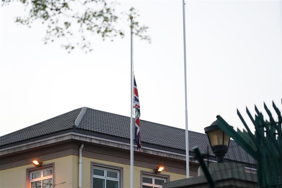 Foreign embassies in China lower flags, mourn for COVID-19 victims