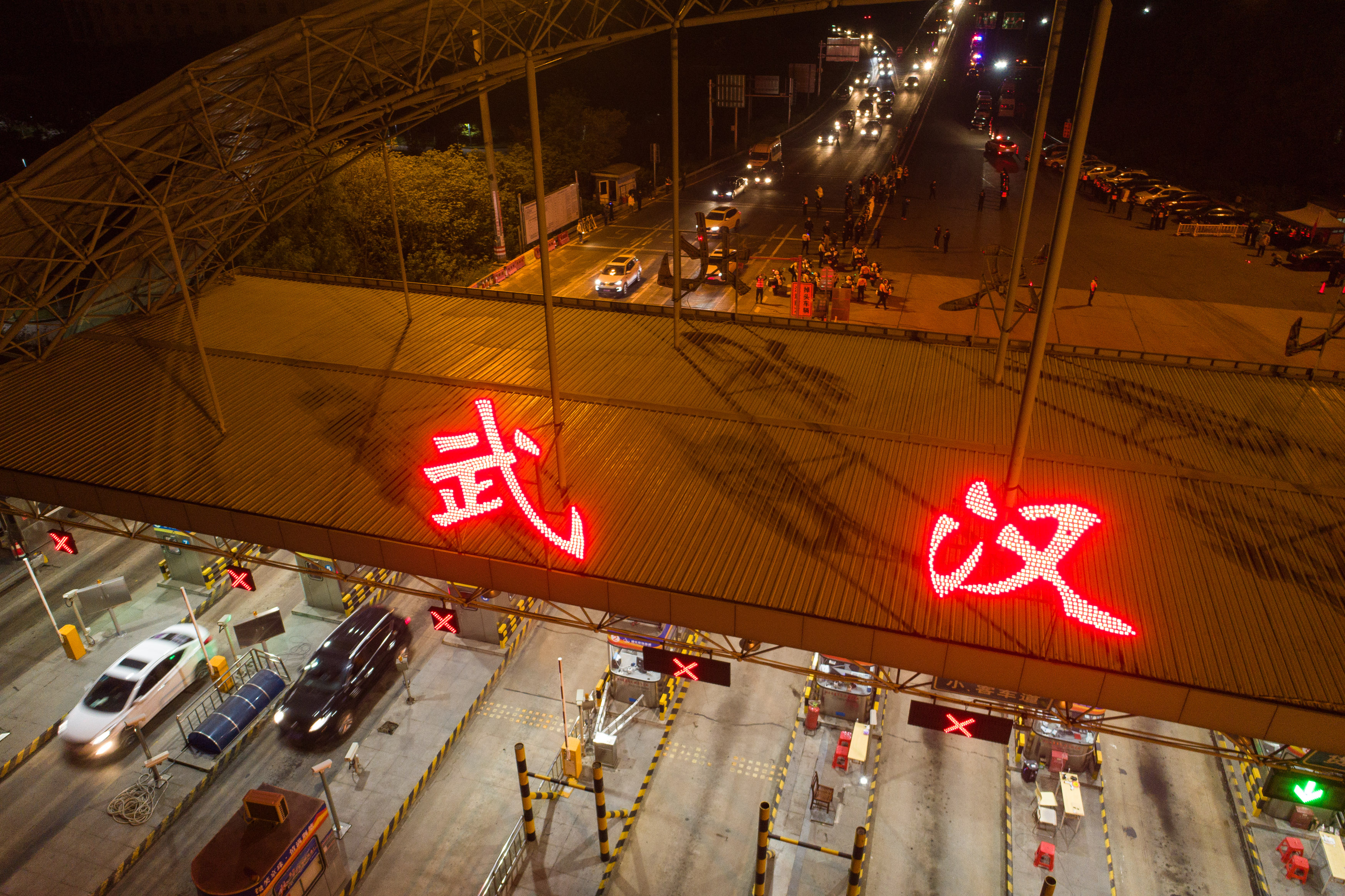 Wuhan lifts outbound travel restrictions, ending months-long lockdown