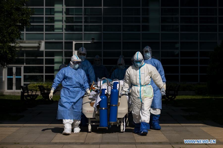 Wards once taken over by medical teams from Beijing closed in Wuhan