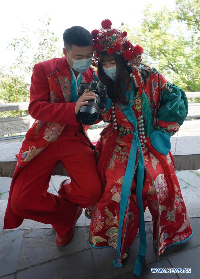 People in Wuhan restart wedding preparations as coronavirus outbreak wanes