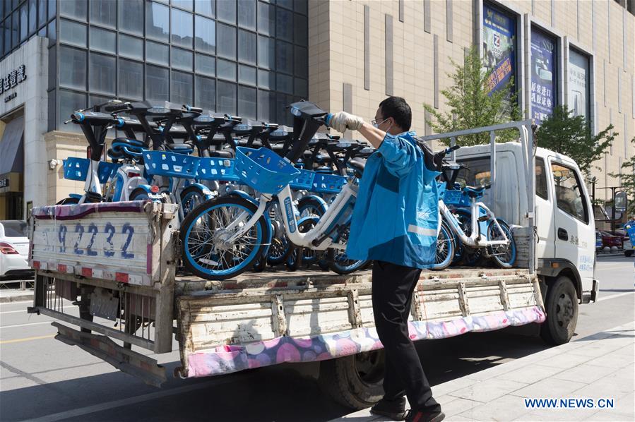 Bicycle-sharing companies restart businesses in Hubei