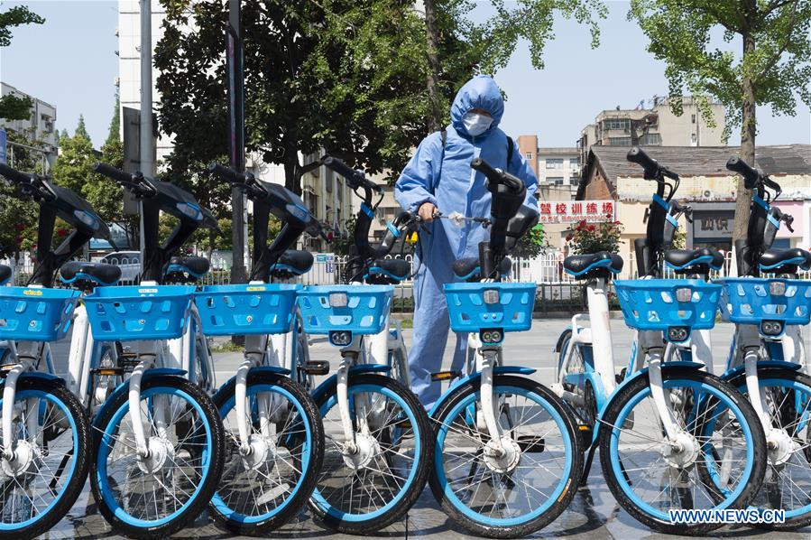 Bicycle-sharing companies restart businesses in Hubei