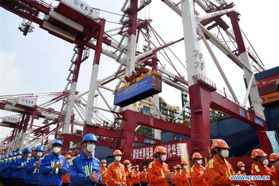 World's largest container ship starts maiden voyage from east China